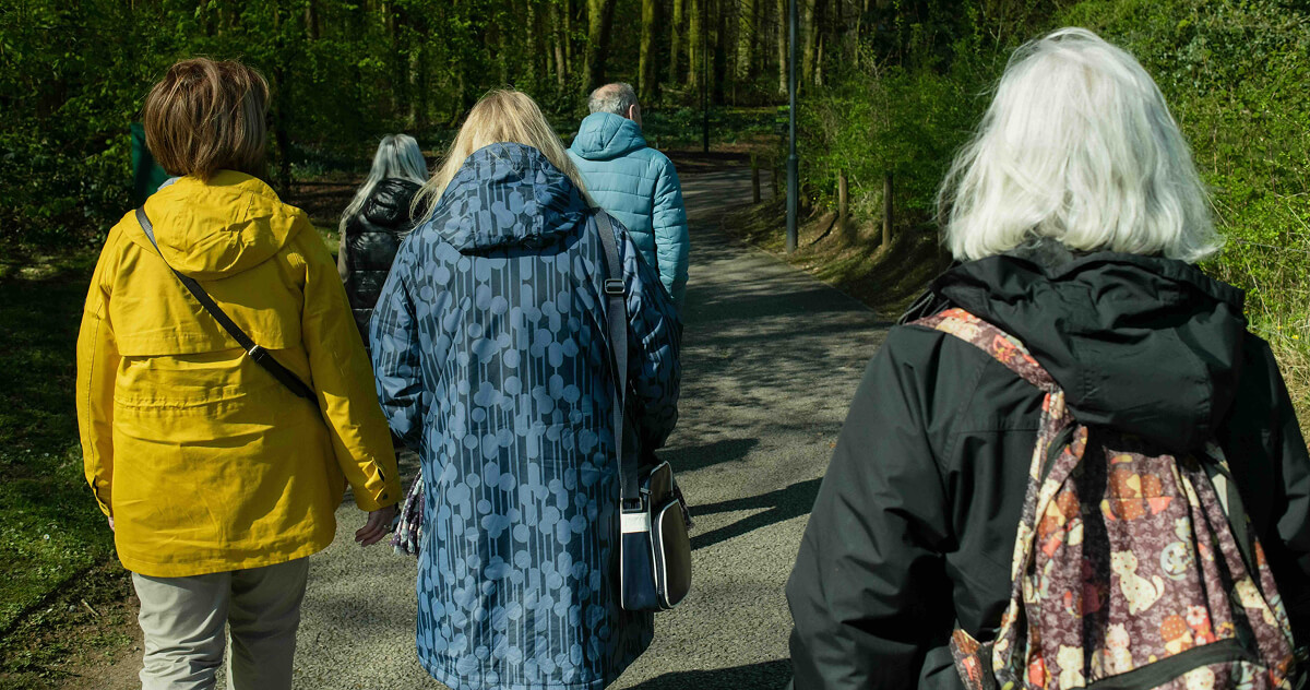 Happy seniors enjoying technology and community